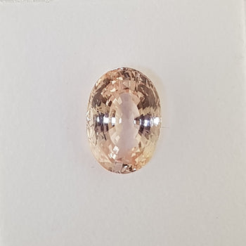 6.17ct Oval Faceted Pale Peach Sapphire 12.7x8.8m