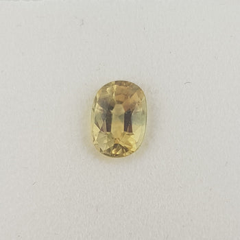 1.04ct Oval Faceted Yellow Bi-Colour Sapphire 6.8x4.8mm