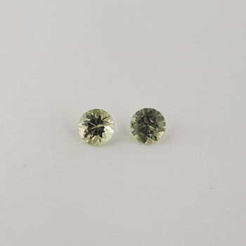 0.57ct Pair of Round Faceted Green Sapphires 3.9x2.6mm
